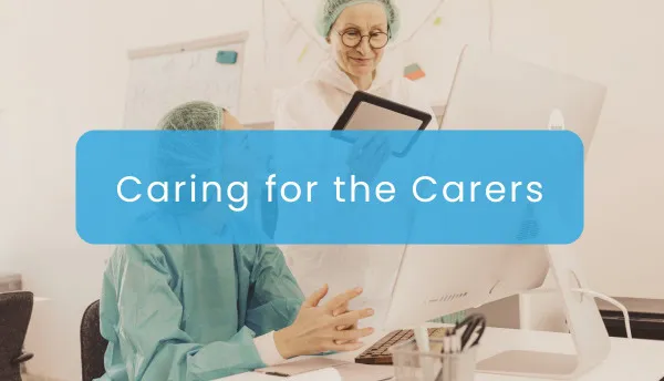 Healthcare professional supporting a carer with mental health resources in the workplace.
